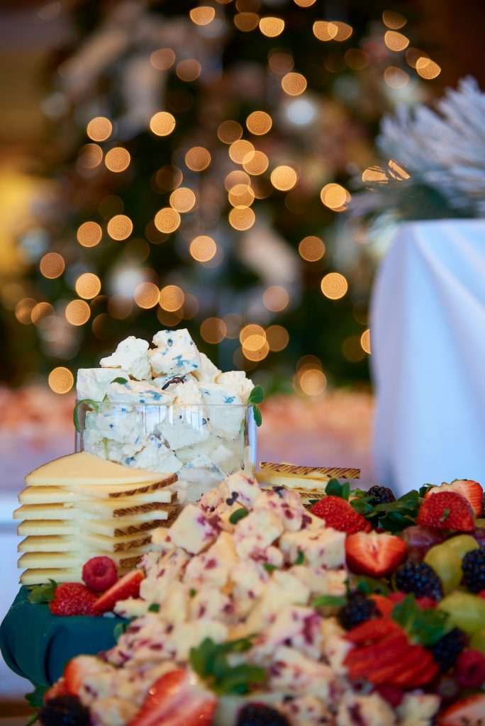 delicious food laying out on a table in time for a colorful and cheerful holiday party